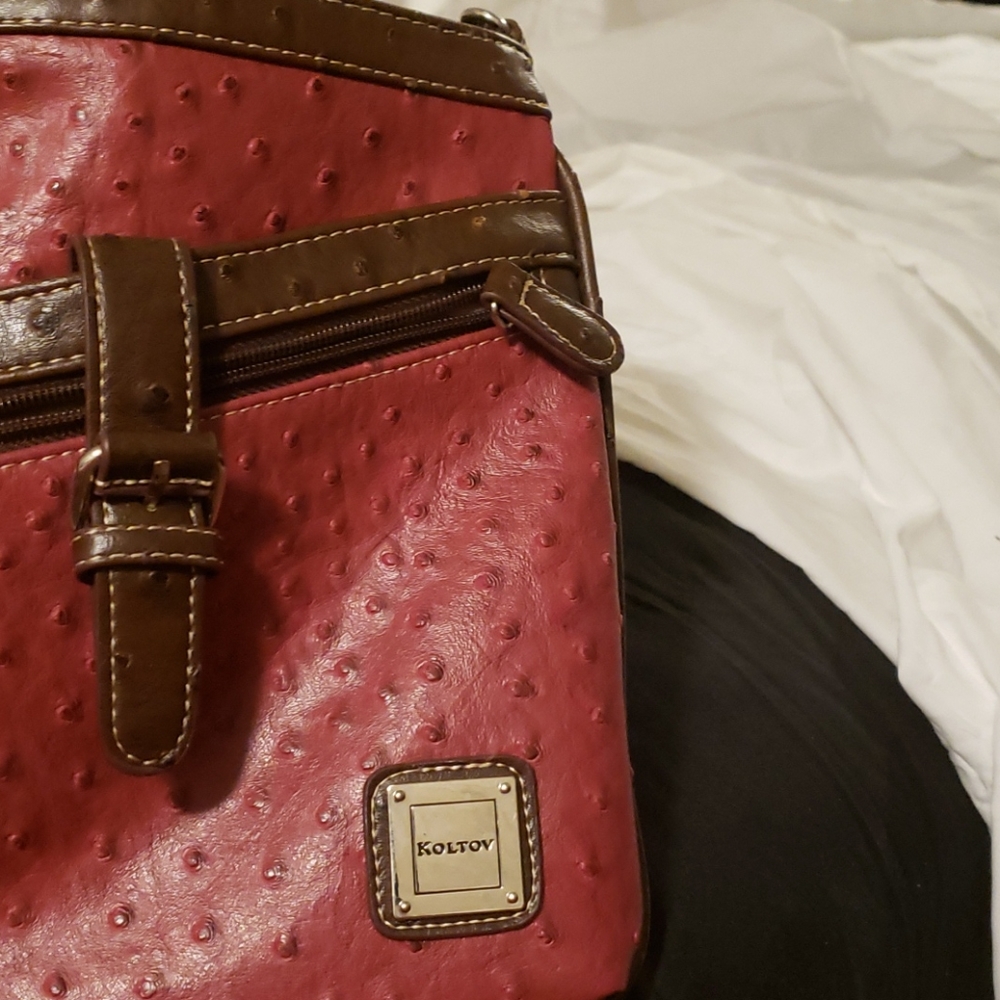 Small purse long strap.